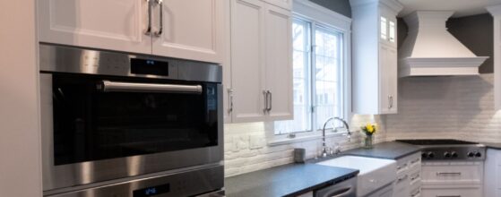 Modern, energy-efficient appliances in a complete kitchen upgrade by Fears Construction featuring B Design in DuPage County.