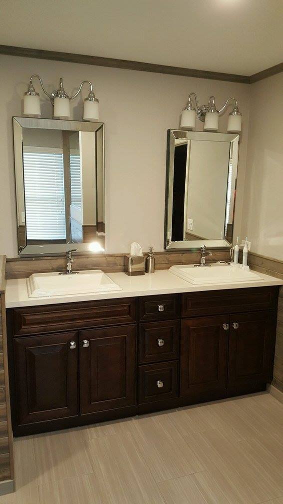 Bathroom vanity in a small refresh project by Fears Construction featuring B Design.