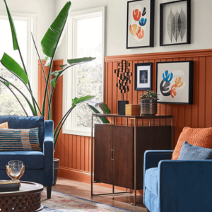 Living room with Cavern Clay paint and modern decor by Fears Construction featuring B Design, offering affordable kitchen remodeling services in Shorewood.