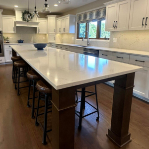 Kitchen refresh with central island placement by Fears Construction featuring B Design, offering budget-friendly kitchen remodeling in Shorewood.