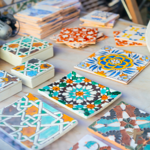 Unique, handcrafted tiles add artisanal charm to a modern kitchen backsplash.